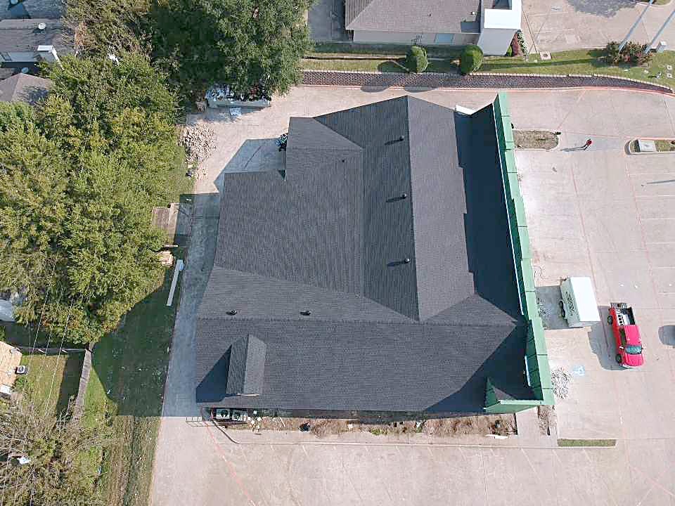 Reveles Roofing crew at work