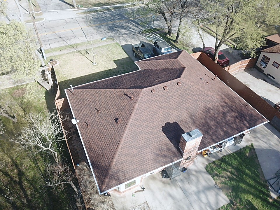 Reveles Roofing crew at work