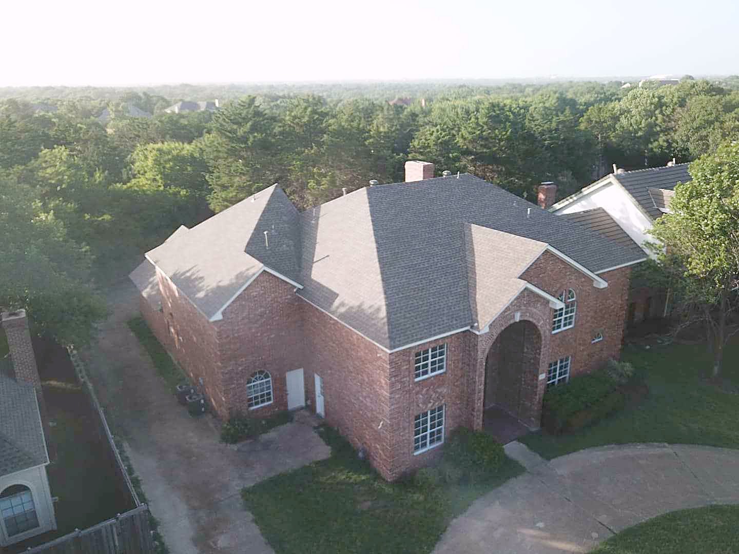 Reveles Roofing at work in Lancaster, TX